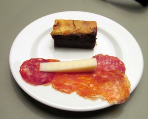Enjoying salamis cheese and a brownie Enjoying salamis cheese and a brownie