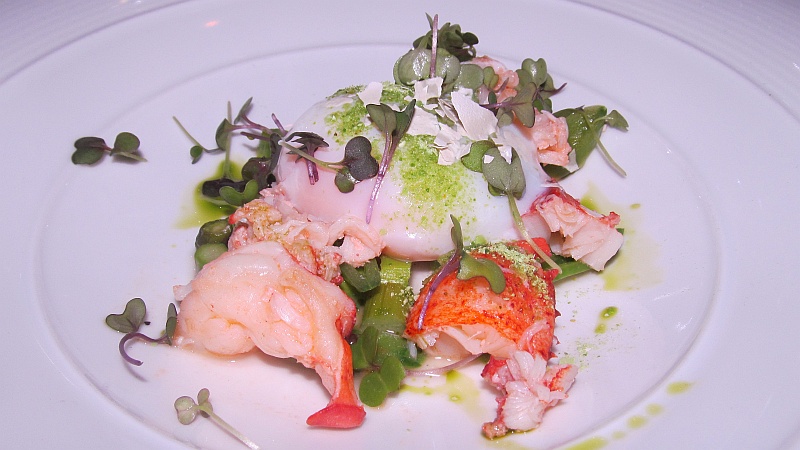 Lobster with freeze dried pea sprouts asparagus and 64 degree egg