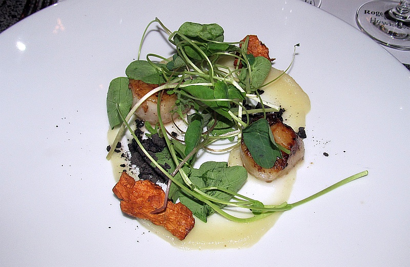 Seared scallop sunchoke puree and squid ink rocks