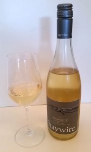 Haywire Switchback Organic Vineyard Pinot Gris 2015 with wine in glass