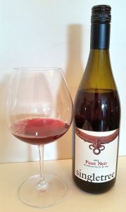 Singletree Pinot Noir 2015 with wine in glass
