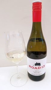 Road 13 Vineyards Chip off the Old Block Chenin Blanc 2017 with wine in glass