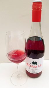 Road 13 Vineyards Honest John's Rosé 2017 with wine in glass
