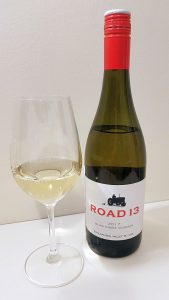 Road 13 Blind Creek Viognier 2017 with wine in the glass