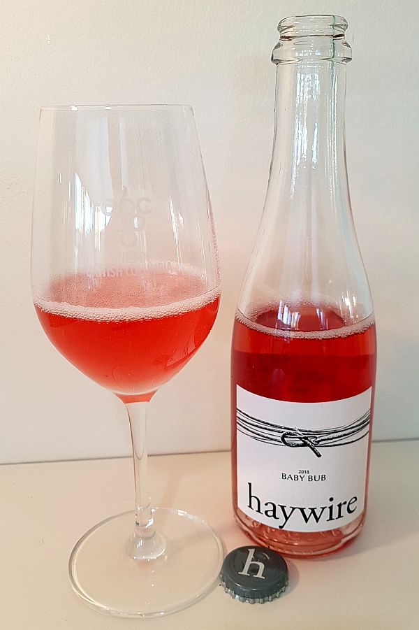 Haywire Baby Bub 2018 with wine in glass
