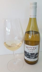 Monte Creek Ranch Chardonnay 2017 with wine in glass
