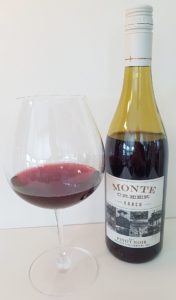 Monte Creek Ranch Pinot Noir 2017 with wine in glass