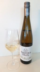 Harper's Trail Field Blend White 2018 with wine in glass