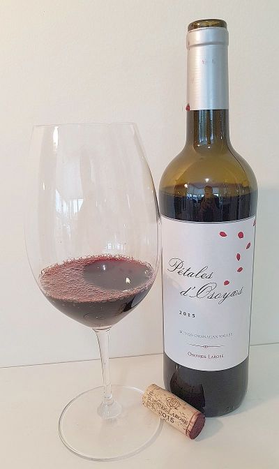 Osoyoos Larose Petales d'Osoyoos 2015 with wine in the glass small