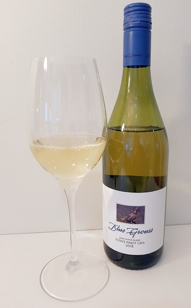 Blue Grouse Estate Pinot Noir 2018 with wine in glass