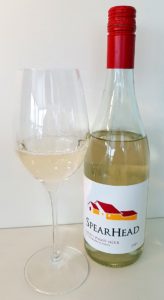 SpearHead Winery White Pinot Noir 2019 with wine in glass