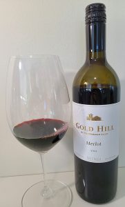 Gold Hill Merlot 2014 with wine in glass