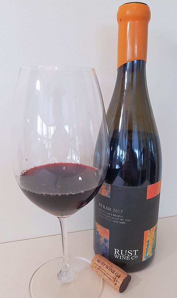 Rust Wine Co Syrah 2017, Golden Mile Bench, South Rock Vineyard with wine in glass