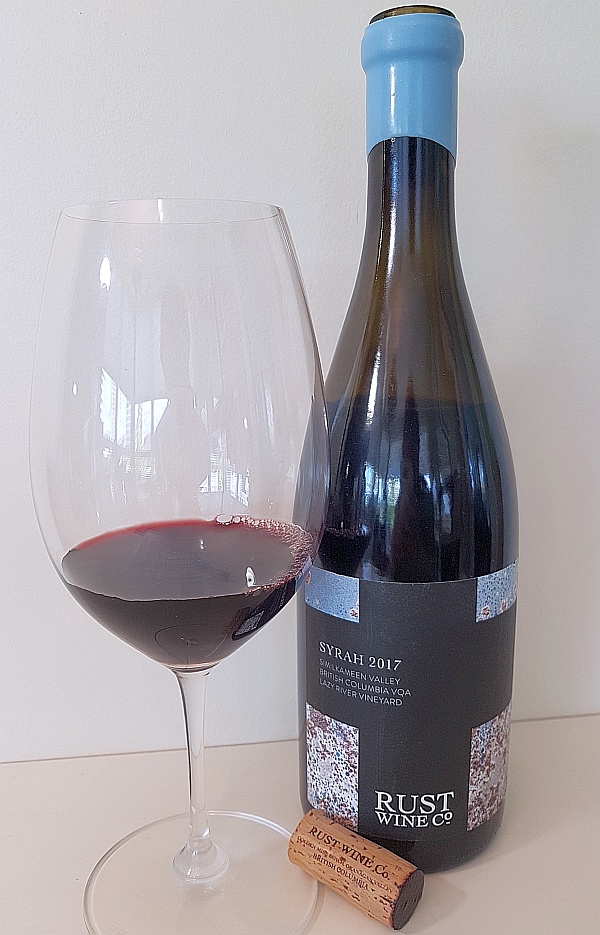 Rust Wine Co Syrah 2017, Similkameen Valley, Lazy River Vineyard with wine in glass