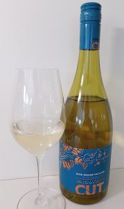 Winemaker's CUT Heritage Gruner Veltliner 2019 with wine in glass
