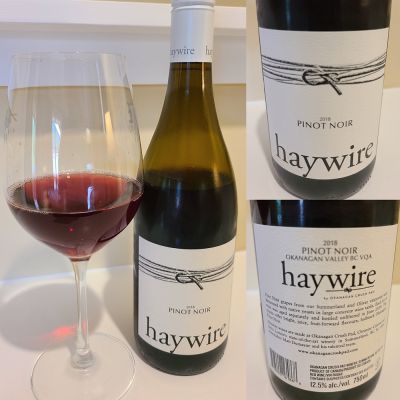 Haywire Pinot Noir 2018 with wine in glass