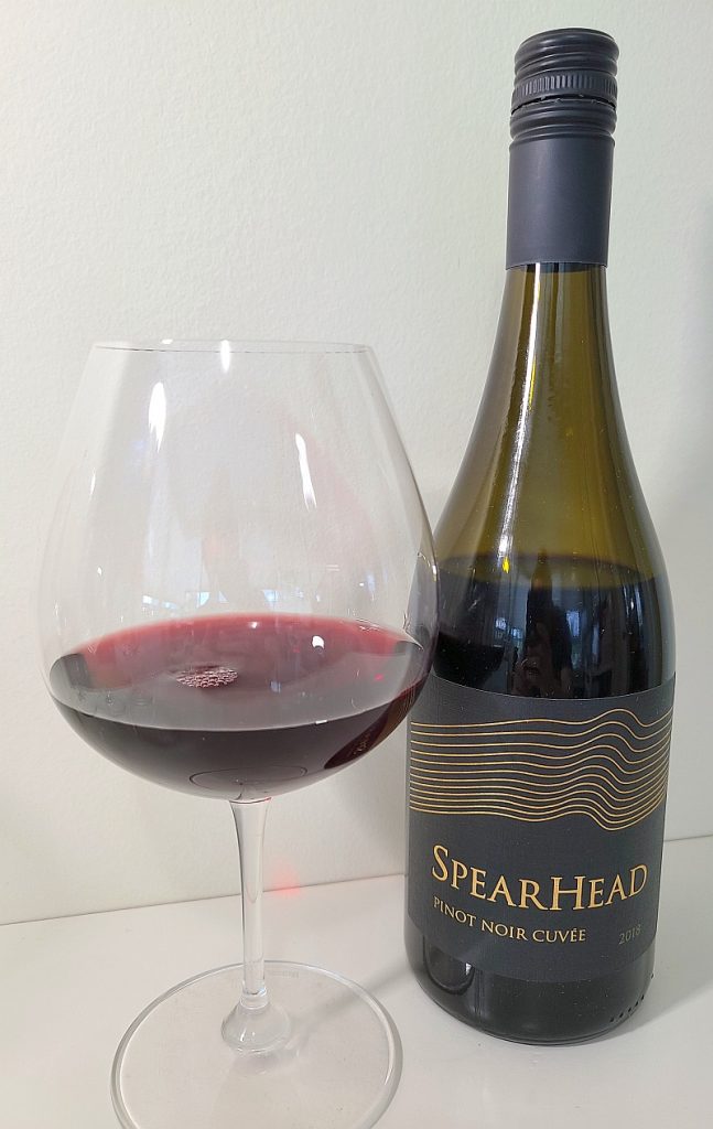 Spearhead Pinot Noir Cuvée 2018 with wine in glass