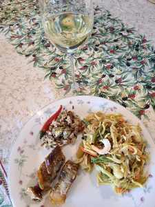 Paco & Lola Albariño 2019 with Filipino pancit noodles, milkfish sisig, and roasted pork belly