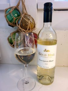 Gold Hill Sauvignon Blanc 2020 with wine in glass