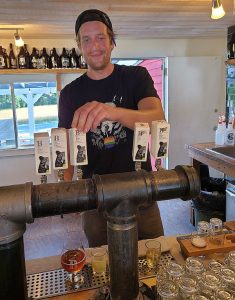 Russell from Brickers Cider pouring some samples