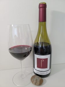 Château Pesquié Terrasses Red 2019 with wine in glass