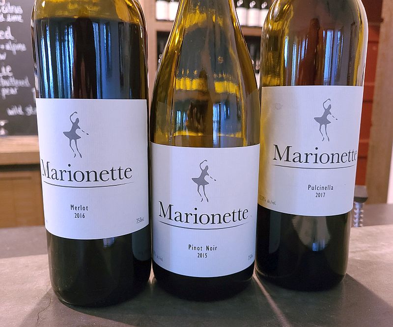 Marionette Vineyards and Winery Merlot, Pinot Noir, and Pulcinella wines