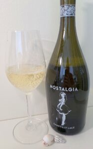 Nostalgia Wines Chantilly Lace 2020 with wine in glass