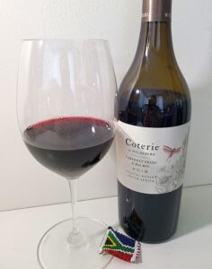 Wildeberg Coterie Cabernet Franc & Malbec 2018 with wine in glass