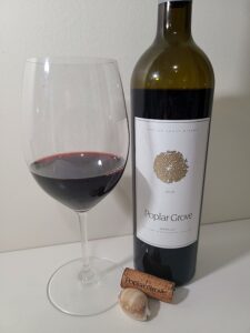 Poplar Grove Winery Merlot 2016 with wine in glass