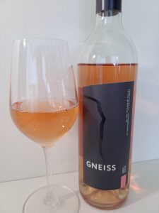 Gneiss Wines Rosé 2020 with wine in glass