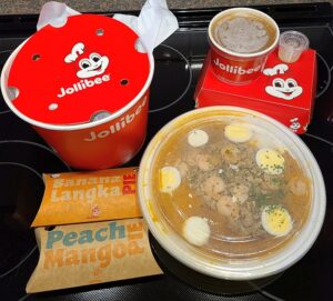 Jollibee chicken, pancit, and dessert items ordered