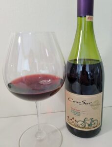 Cono Sur Pinot Noir Organic Wine 2019 with wine in glass