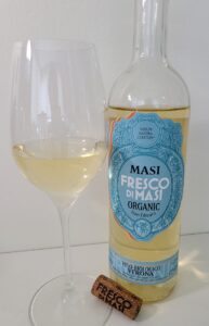 Masi Fresco di Masi Bianco Verona IGT 2020 with wine in glass
