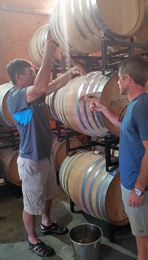 Getting a Pinot Noir barrel sample at Privato Winery