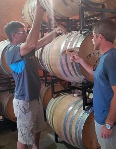 Getting a Pinot Noir barrel sample at Privato Winery