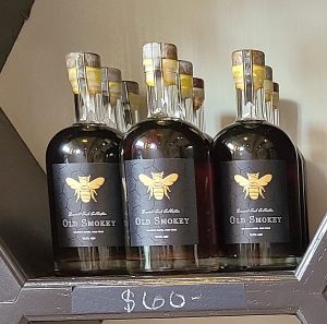 Bottles of Rosewood Estate Winery & Meadery Old Smokey 2018 mead