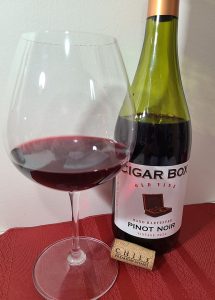 Cigar Box Old Vine Pinot Noir 2022 with wine in glass