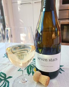 Township 7 seven stars Aurora 2019 with wine in glass