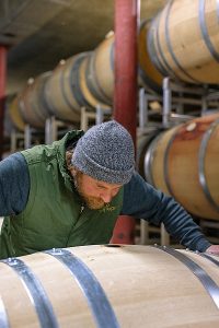 Blasted Church winemaker checking barrel -Production-credit-John Adrian-25