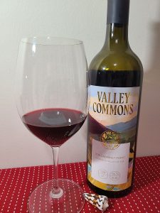 Valley Commons Cabernet Franc 2018 with wine in glass