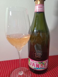 Sparkling Jansz Tasmania Premium Rosé, NV with wine in glass