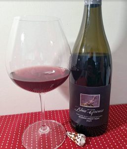 Blue Grouse Estate Winery Reserve Pinot Noir 2021 with wine in glass