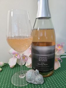 Church & State Wines Gris de Noir Brut 2020 with wine in glass