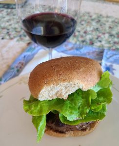 Grilled prime rib burger paired with Mayhem Wines Cabernet Merlot 2022