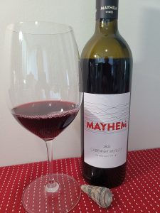 Mayhem Wines Cabernet Merlot 2022 with wine in glass