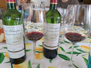 Chateau Puy Blanquet St. Emilion Grand Cru St. Emilion Bordeaux 2005 and 2008 with wines in glasses