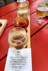 Taves Estate Cidery Nanny's Nicest, Ram's Black Currant, Charlie's Pumpkin, Genji's Goji Berry, and Hopped ciders in glasses