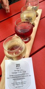 Taves Estate Cidery Pete's Pumpkin, Tux's Treasure - Blackberry Vanilla, Gander's Gooseberry, and Vintage ciders in glasses