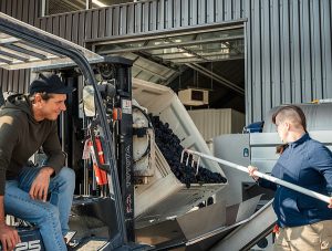 Grant Stanley working hard supervising grape production (photo by Ken Hagen)