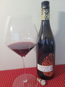 Frind Estate Winery Pinot Noir Cuvée 2022 with wine in glass